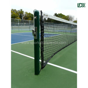 Green LDK pickleball net post installed on outdoor court with HDPE net