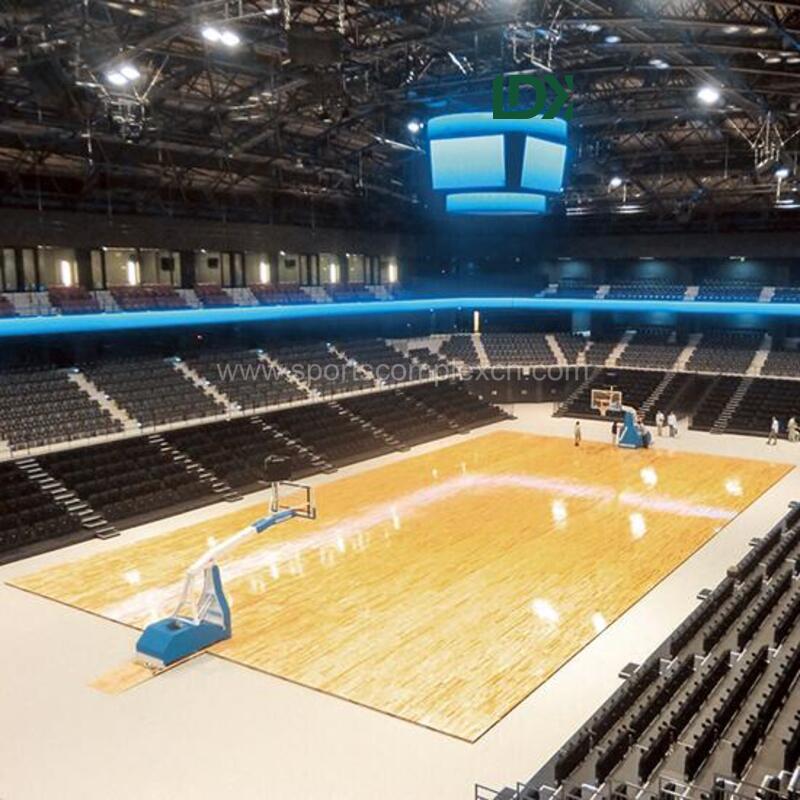 Professional hardwood basketball flooring installed in indoor sports arena