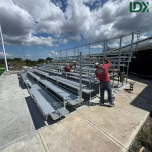 Workers Installing LDK Aluminum Bleachers At Outdoor Soccer Stadium, Durable Sports Seats