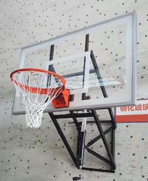 Clear floor court view showing space saving overhead roof mounted basketball hoop.