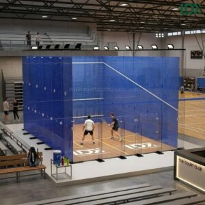 LDK glass squash court installation project case inside a sports stadium, demonstrating actual facility application with players in action.