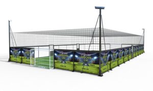 Front angle of LDK enclosed soccer cage with green side panels and standard football goal