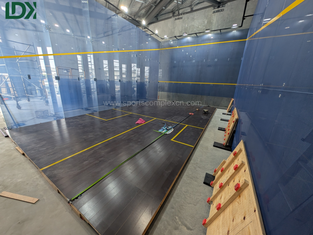 Squash court flooring installation at an indoor sports facility